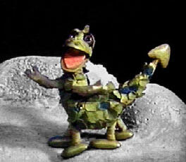 The character Soup dragon from the Clangers. She has her arms outstreched.